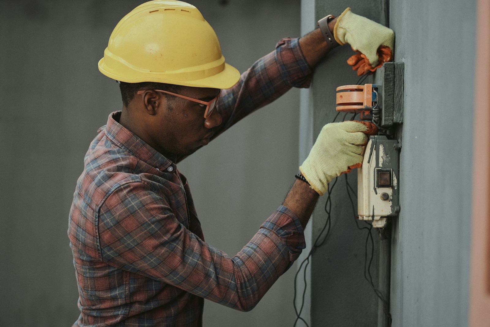 Electrician working on a panel