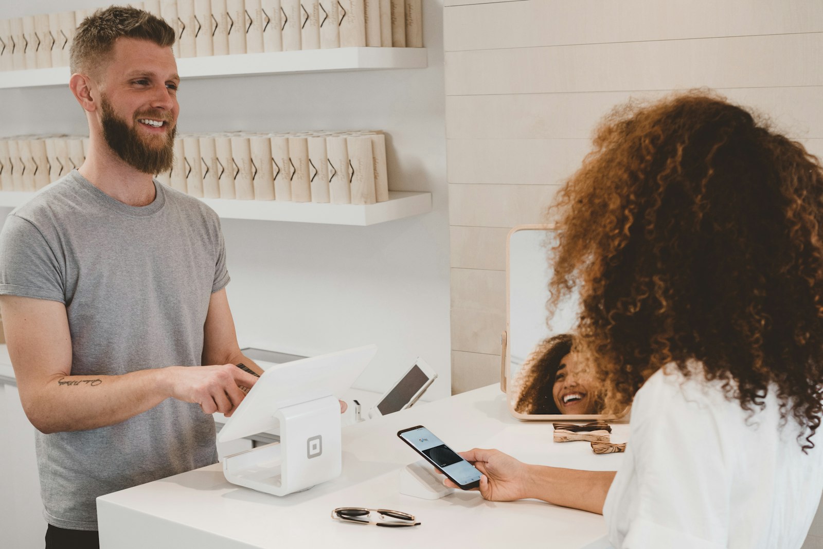 Insurance agent talking with a client at a counter